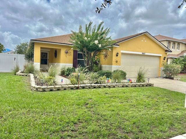10607 Boyette Creek Blvd, Riverview, FL 33569 - view of front of property featuring stucco siding, driveway, and an attached garage
