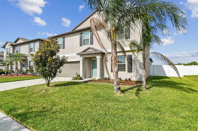view of front of home with fence, an attached garage, concrete driveway, stucco siding, and a front yard