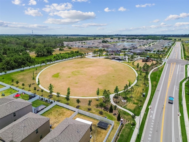 birds eye view of property with a residential view