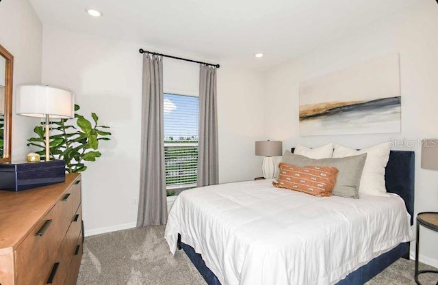 bedroom with light carpet, baseboards, and recessed lighting