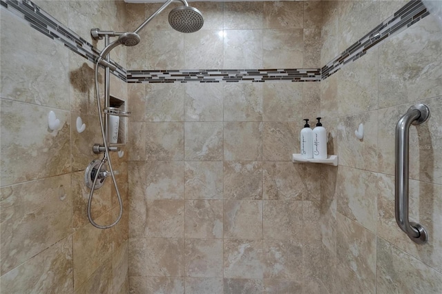 bathroom with tiled shower