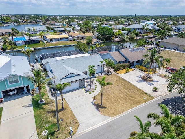 aerial view of residential area with a nearby body of water