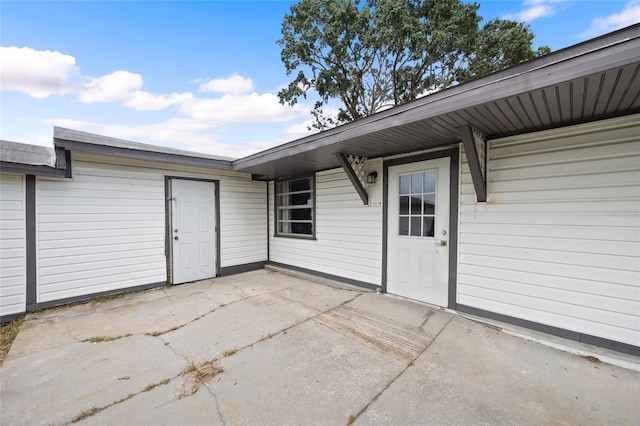 916 Shangri La Dr, Seffner, FL 33584 - doorway to property with a patio