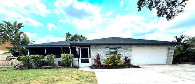 916 Shangri La Dr, Seffner, FL 33584 - ranch-style house with a garage, concrete driveway, and a front lawn