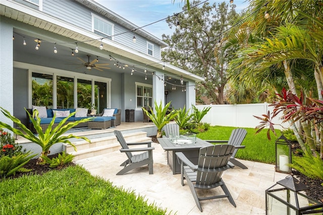 3611 W Royal Palm Cir, Tampa, FL 33629 - view of patio / terrace featuring a ceiling fan, an outdoor living space with a fire pit, and fence