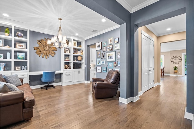 3611 W Royal Palm Cir, Tampa, FL 33629 - office area featuring built in study area, ornamental molding, hardwood / wood-style floors, a chandelier, and baseboards