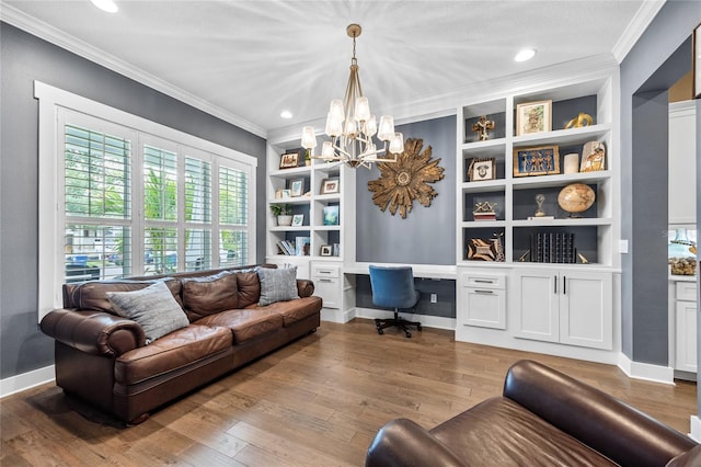 3611 W Royal Palm Cir, Tampa, FL 33629 - office area featuring built in desk, built in shelves, ornamental molding, a chandelier, and hardwood / wood-style floors