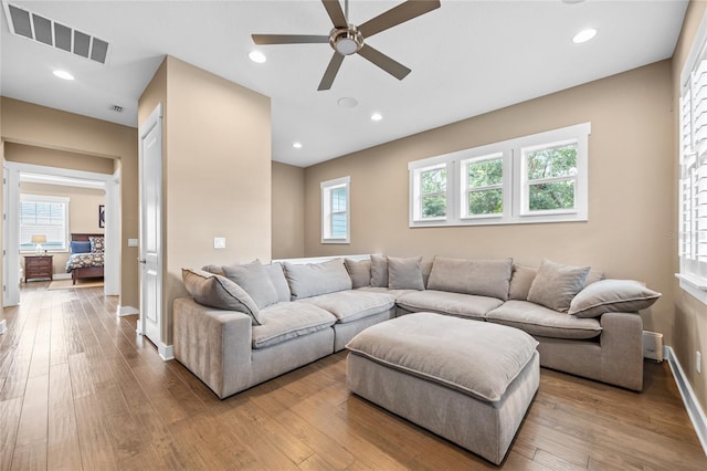3611 W Royal Palm Cir, Tampa, FL 33629 - living area with a ceiling fan, hardwood / wood-style flooring, baseboards, and recessed lighting