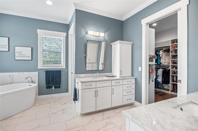3611 W Royal Palm Cir, Tampa, FL 33629 - bathroom with vanity, marble look tiles, crown molding, a soaking tub, and baseboards