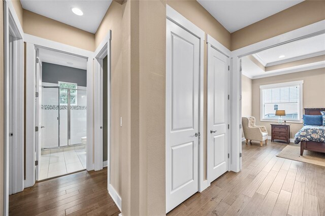 3611 W Royal Palm Cir, Tampa, FL 33629 - corridor featuring wood finished floors and baseboards