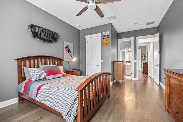 3611 W Royal Palm Cir, Tampa, FL 33629 - bedroom with baseboards, wood finished floors, and a ceiling fan