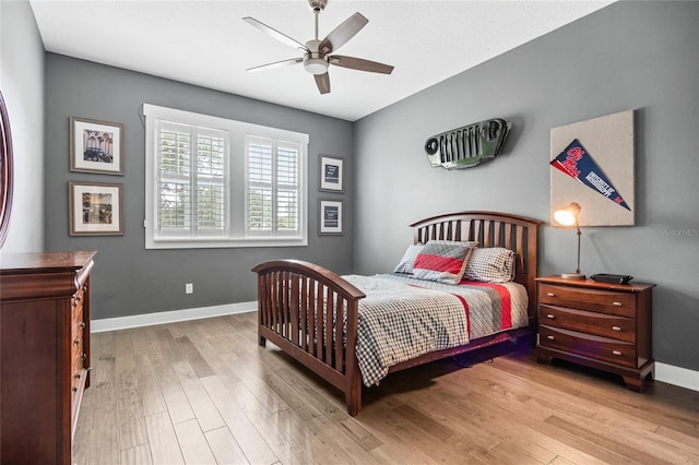 3611 W Royal Palm Cir, Tampa, FL 33629 - bedroom featuring wood finished floors, baseboards, and a ceiling fan