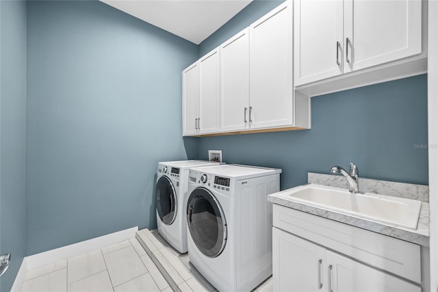 3611 W Royal Palm Cir, Tampa, FL 33629 - clothes washing area featuring cabinet space, washer and dryer, and baseboards