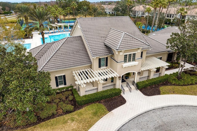 view of subject property featuring a pool area