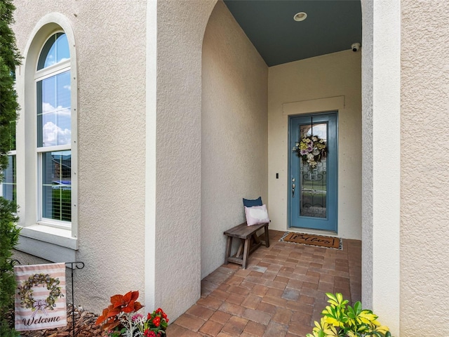 1104 Isobel Reserve Ln, Tampa, FL 33613 - doorway to property with stucco siding