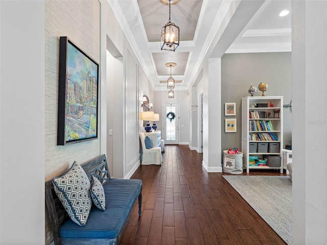 1104 Isobel Reserve Ln, Tampa, FL 33613 - entryway featuring dark wood-type flooring, baseboards, crown molding, and a chandelier