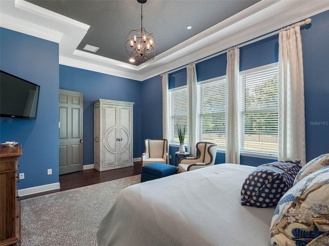 1104 Isobel Reserve Ln, Tampa, FL 33613 - bedroom featuring ornamental molding, a chandelier, baseboards, wood finished floors, and a tray ceiling