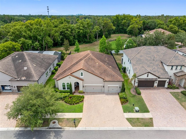 1104 Isobel Reserve Ln, Tampa, FL 33613 - aerial view of property and surrounding area featuring a heavily wooded area