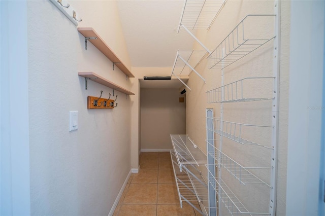 445 Noble Faire Dr, Sun City Center, FL 33573 - spacious closet featuring tile patterned flooring