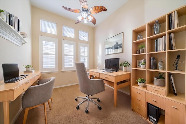 445 Noble Faire Dr, Sun City Center, FL 33573 - home office with a ceiling fan, light colored carpet, and baseboards