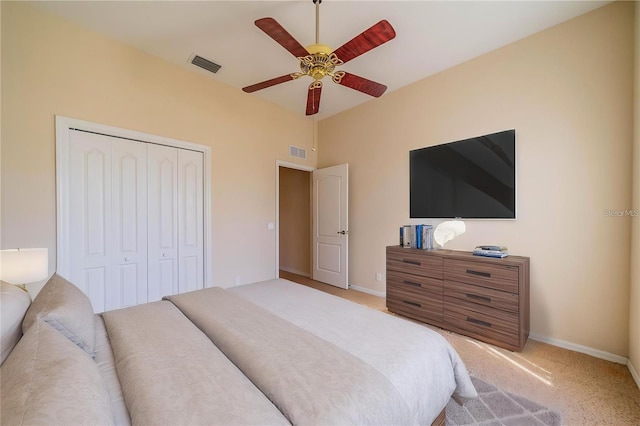 445 Noble Faire Dr, Sun City Center, FL 33573 - bedroom with a closet, light colored carpet, and baseboards