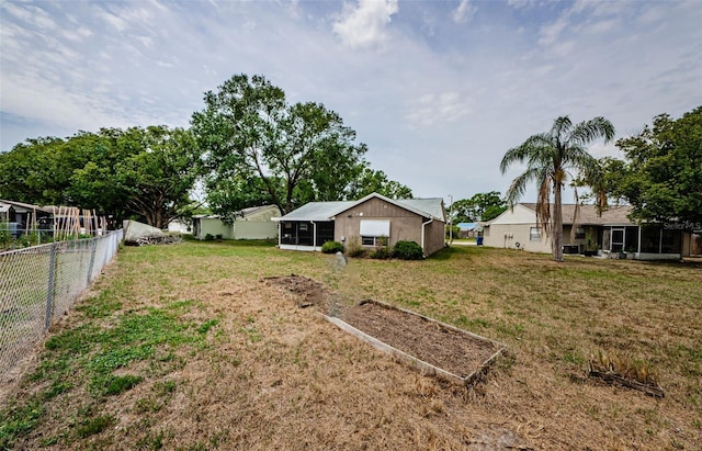 7763 Jenner Ave, New Port Richey, FL 34655 - view of yard with a sunroom