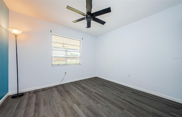 7763 Jenner Ave, New Port Richey, FL 34655 - unfurnished room with dark wood-type flooring, ceiling fan, and baseboards