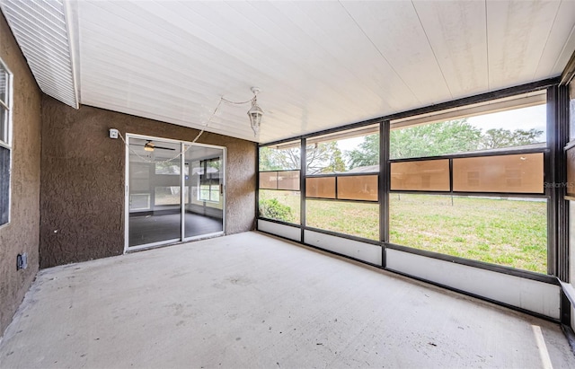 7763 Jenner Ave, New Port Richey, FL 34655 - unfurnished sunroom with a ceiling fan