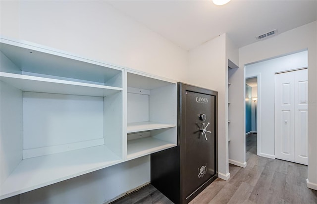 7763 Jenner Ave, New Port Richey, FL 34655 - mudroom with wood finished floors and baseboards