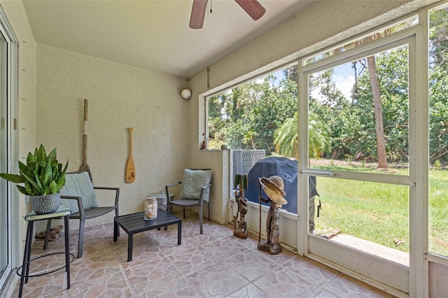 11162 Kapok Grand Cir, Madeira Beach, FL 33708 - sunroom / solarium featuring a ceiling fan