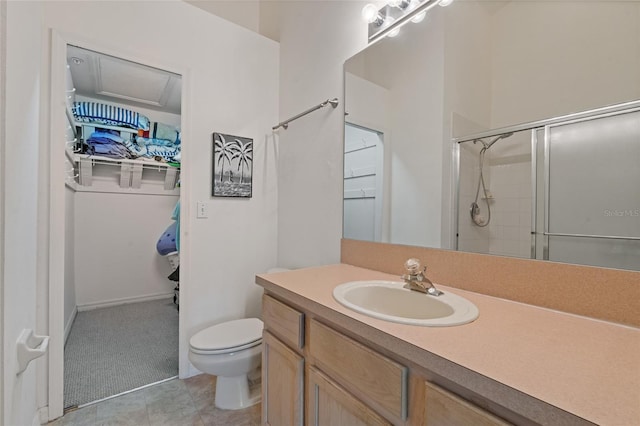 11162 Kapok Grand Cir, Madeira Beach, FL 33708 - full bathroom with a shower with shower door, vanity, and a walk in closet