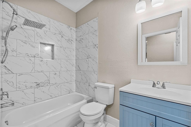 bathroom with toilet,  shower combination, vanity, and a textured wall