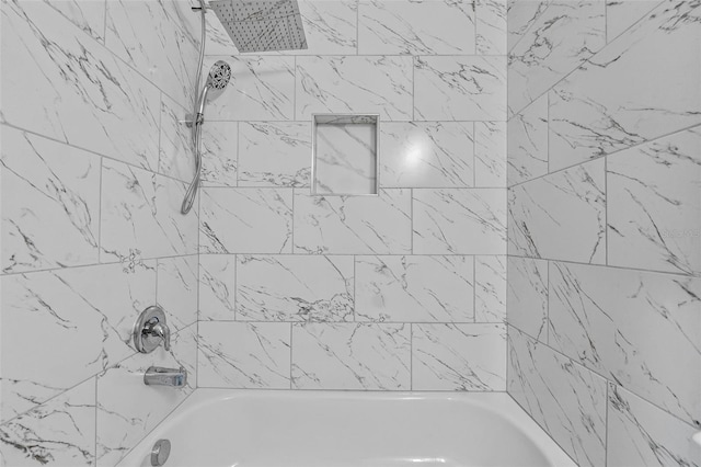 bathroom with shower / bathtub combination