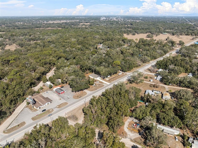 bird's eye view featuring a view of trees