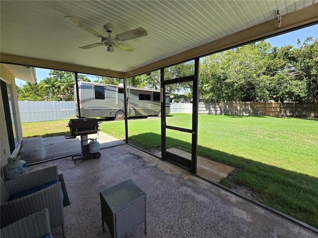 827 Creekside Ln, Palm Harbor, FL 34684 - unfurnished sunroom with ceiling fan