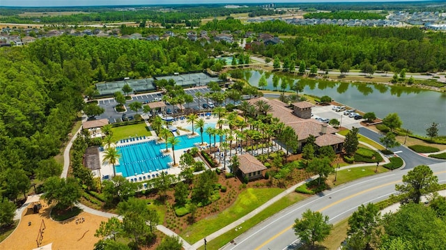 aerial overview of property's location featuring a pool area and a large body of water