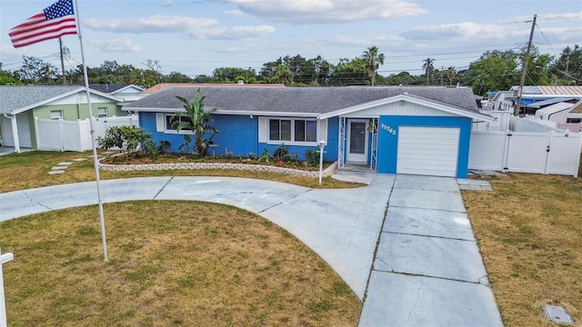 11762 82nd Ter, Seminole, FL 33772 - ranch-style home with curved driveway, a gate, a garage, and roof with shingles