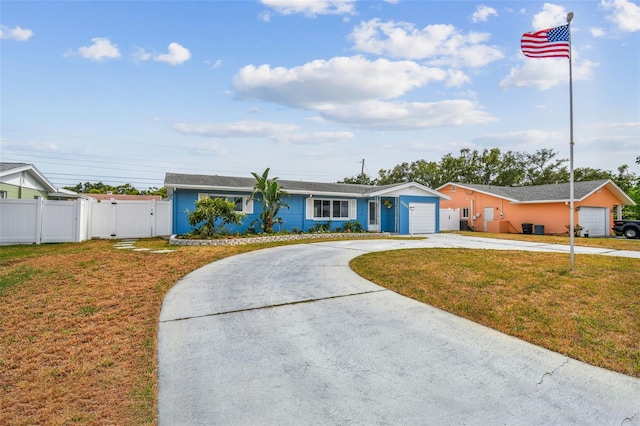 11762 82nd Ter, Seminole, FL 33772 - single story home featuring curved driveway, a gate, and a garage