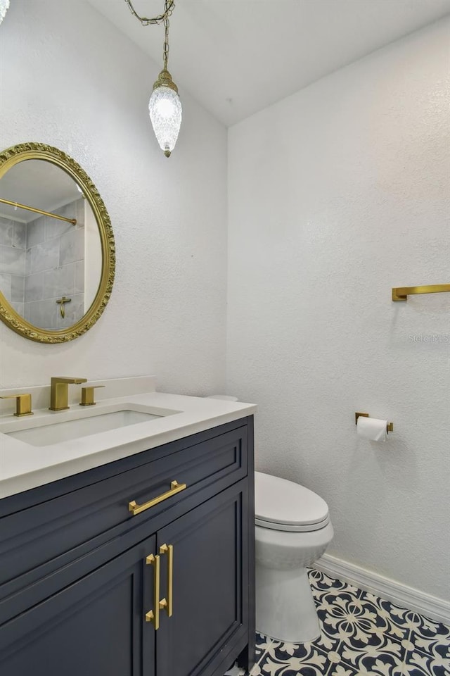 11762 82nd Ter, Seminole, FL 33772 - full bath with toilet, vanity, baseboards, tile patterned flooring, and a shower