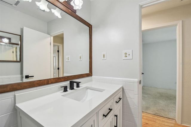 11762 82nd Ter, Seminole, FL 33772 - bathroom with wood finished floors and vanity