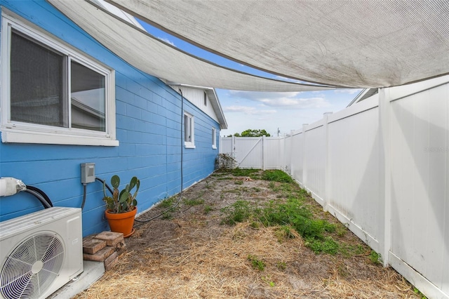 11762 82nd Ter, Seminole, FL 33772 - view of home's exterior featuring a fenced backyard and ac unit
