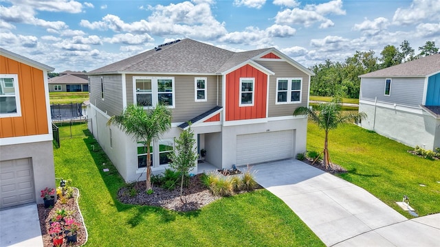 12710 Hysmith Loop, Parrish, FL 34219 - view of front of house featuring driveway, board and batten siding, a garage, a shingled roof, and stucco siding