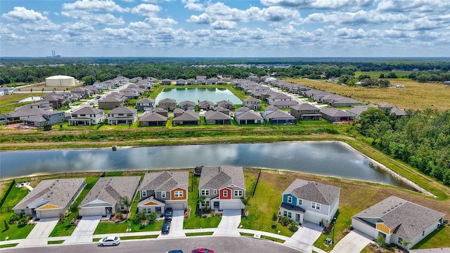 12710 Hysmith Loop, Parrish, FL 34219 - aerial perspective of suburban area with a nearby body of water