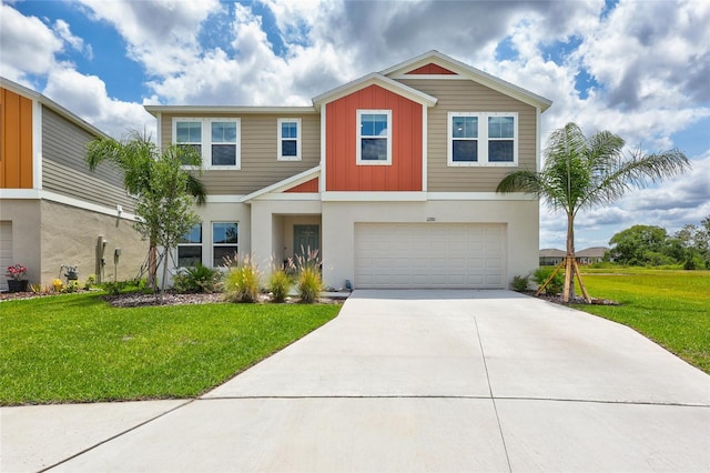12710 Hysmith Loop, Parrish, FL 34219 - view of front facade with board and batten siding, driveway, an attached garage, a front lawn, and stucco siding