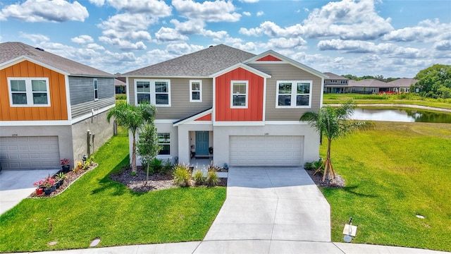 12710 Hysmith Loop, Parrish, FL 34219 - view of front of property featuring a garage, board and batten siding, driveway, a water view, and stucco siding
