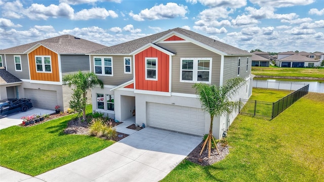 12710 Hysmith Loop, Parrish, FL 34219 - view of front of house featuring a garage, concrete driveway, stucco siding, board and batten siding, and a shingled roof