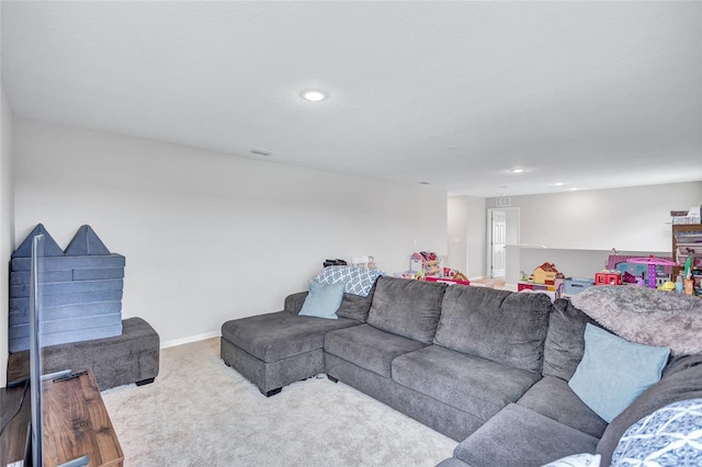 12710 Hysmith Loop, Parrish, FL 34219 - living room featuring carpet flooring, recessed lighting, and baseboards