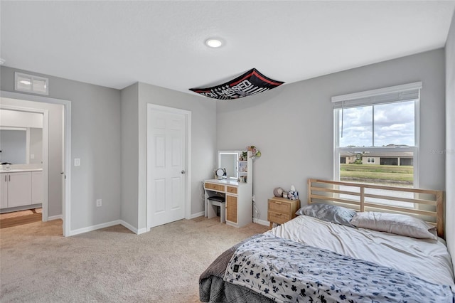 12710 Hysmith Loop, Parrish, FL 34219 - bedroom with light carpet and baseboards