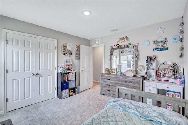 12710 Hysmith Loop, Parrish, FL 34219 - bedroom featuring carpet, a closet, and baseboards