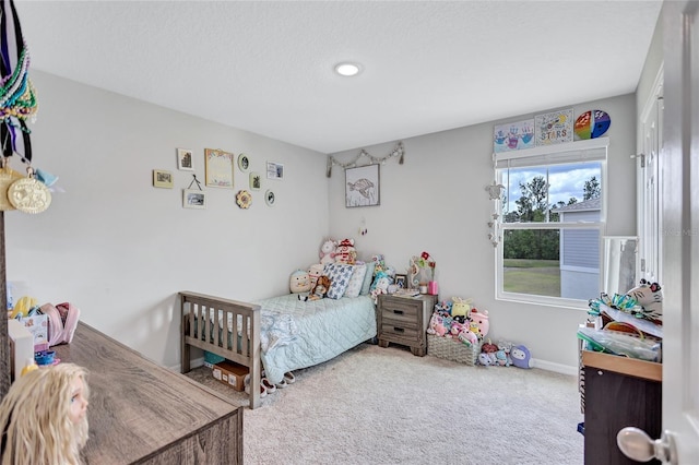 12710 Hysmith Loop, Parrish, FL 34219 - carpeted bedroom featuring baseboards and recessed lighting